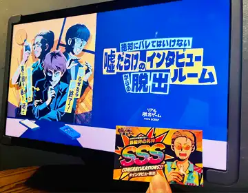 インタビュー脱出「タブレット画面と最終ランクカード」の写真